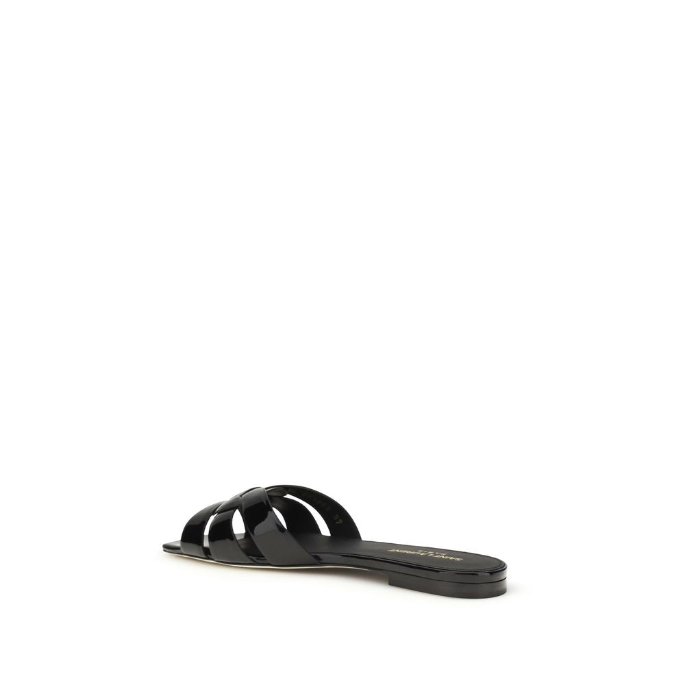 Saint Laurent flate sandaler i sort kalveskinn av Bos Taurus