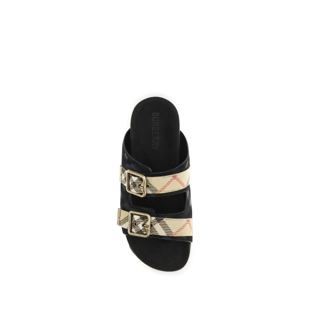 Burberry svarte kalveskinn Bos Taurus stroppesandaler