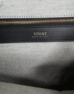 Versace hvit crossbody-veske i kanvasskinn med topphåndtak og logo