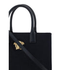 Versace svart bomullsskulderveske